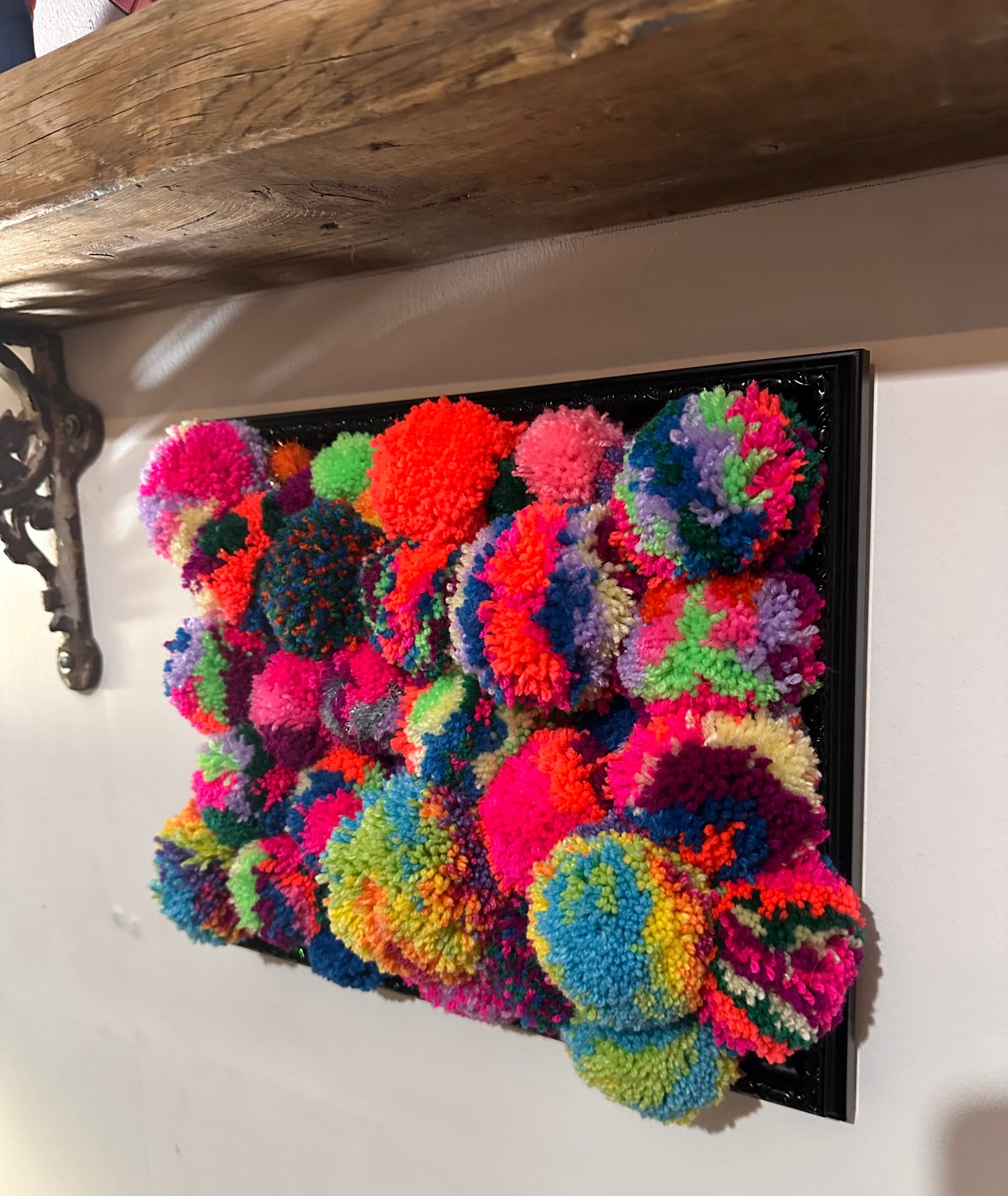 Pom Poms in a frame