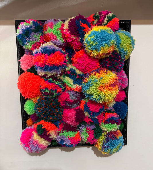 Pom Poms in a frame