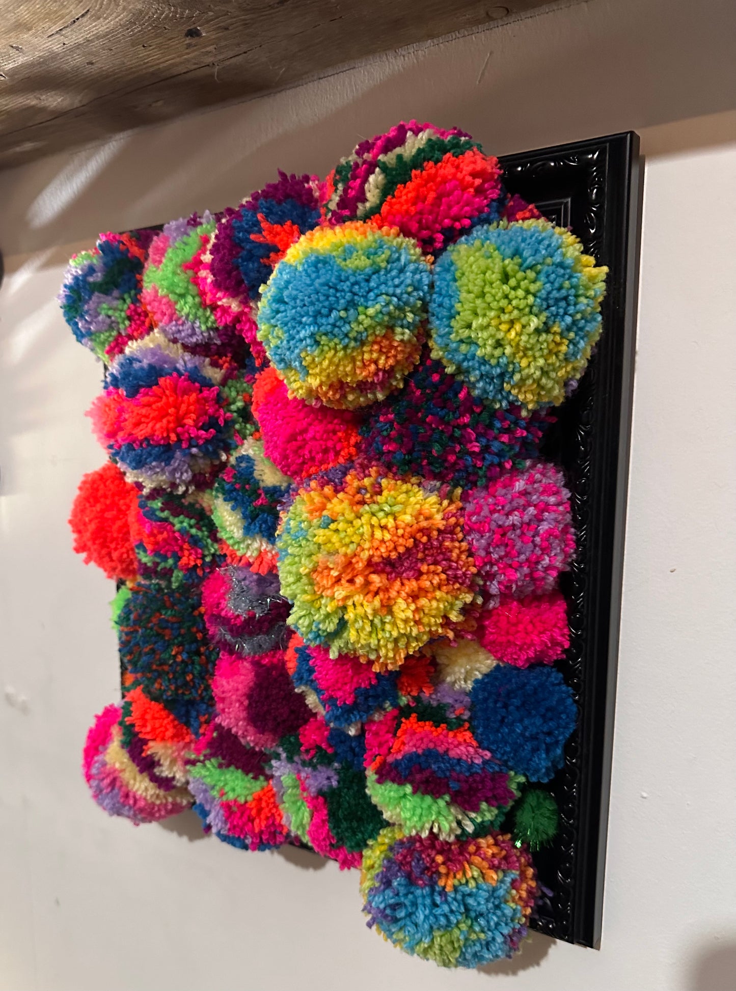 Pom Poms in a frame