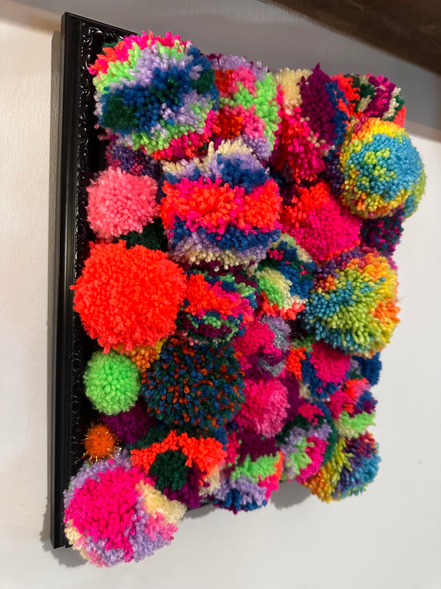 Pom Poms in a frame